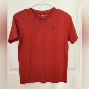 TWO (2) Tommy Hilfiger T-shirts for boys in red and gray, size medium (12/14).